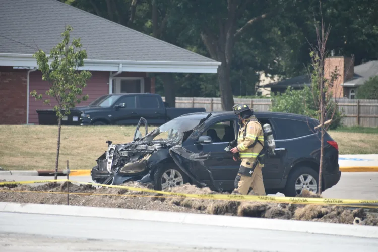 Car fire put out at Kwik Trip